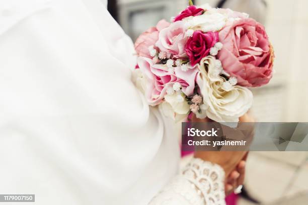 Bride Holding Bridal Bouquetwedding Bouquet In Hands Of Bride Stock Photo - Download Image Now