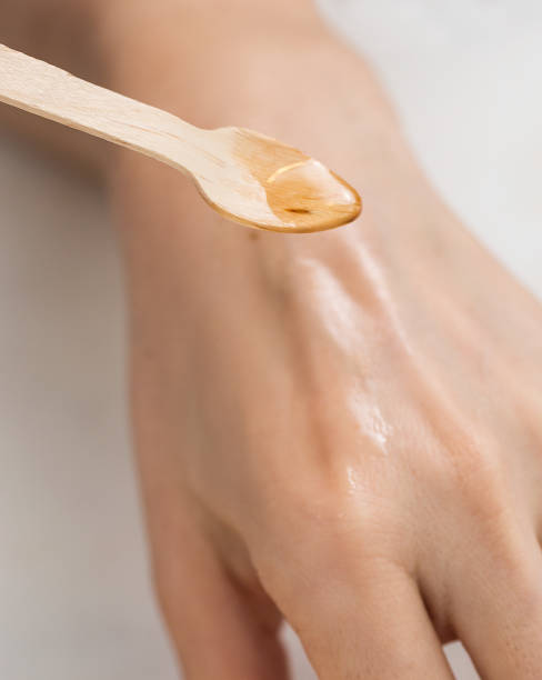 istock Beautiful sensual woman with honey on her hands 1179009295