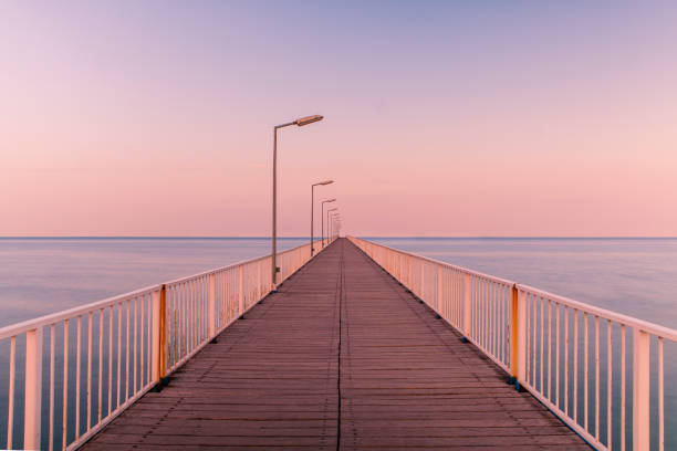istock The Pontoon Bridge Mamaia at sunset.(Pasarela) Dock on the Beach 1179010064