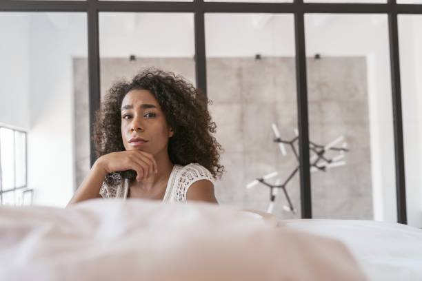 istock Emotional international girl being deep in her thoughts 1179010892