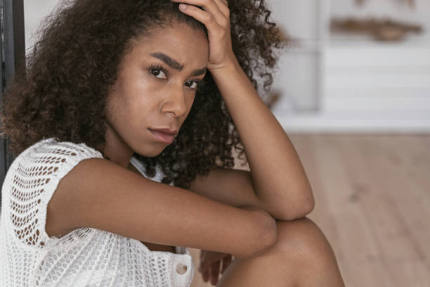 istock Serious young brunette girl being deep in thoughts 1179011161