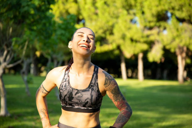 istock Young sportswoman exercising in the park 1179014363