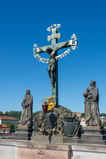 istock Crucifix statue on the Charles Bridge in Prague 1179014818