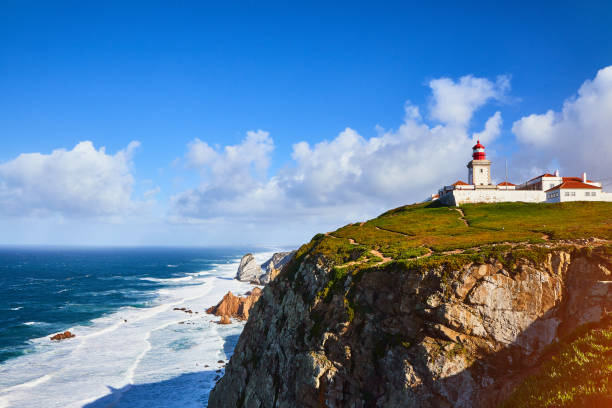 istock Cabo da Roca, Portugal. Lighthouse and cliffs over Atlantic Ocean, the most westerly point of the European mainland. 1179019615