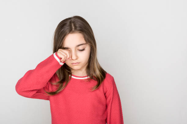 istock Little girl rubbed her eyes 1179020237