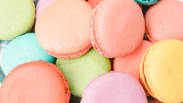 istock French Colorful Macarons on Pink Background 1179020638