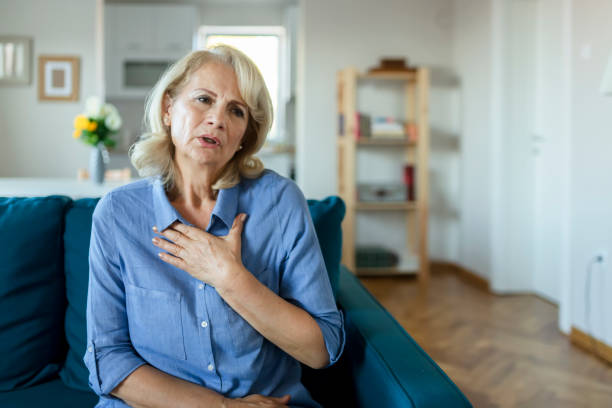 istock Senior Woman Suffering From Chest Pain 1179022465