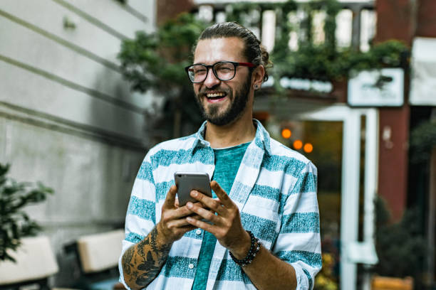 istock Portrait of a hipster guy, waiting for uber 1179023986