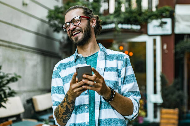 istock Portrait of a hipster guy, waiting for uber 1179023997