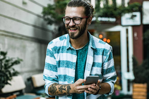 istock Portrait of a hipster guy, waiting for uber 1179024509