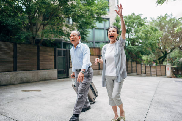 istock Senior couple returning home from vacation 1179024913