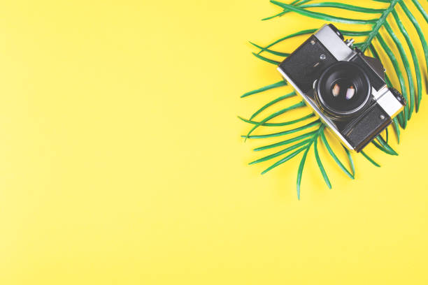 istock Travelling and photography concept on yellow. 1179035965