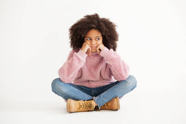 istock Cute thoughtful girl 1179036861
