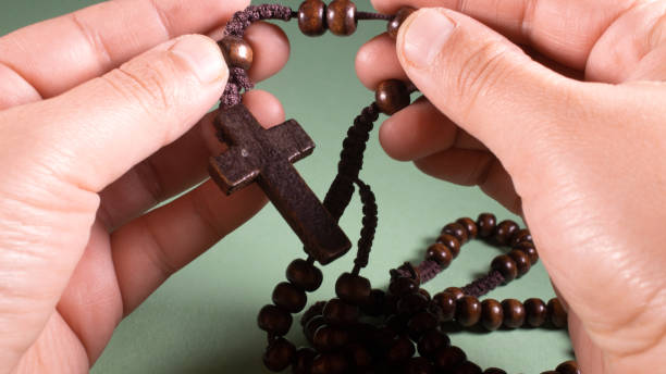istock Rosary on a green background, pray, pray, make requests. Faith 1179043651