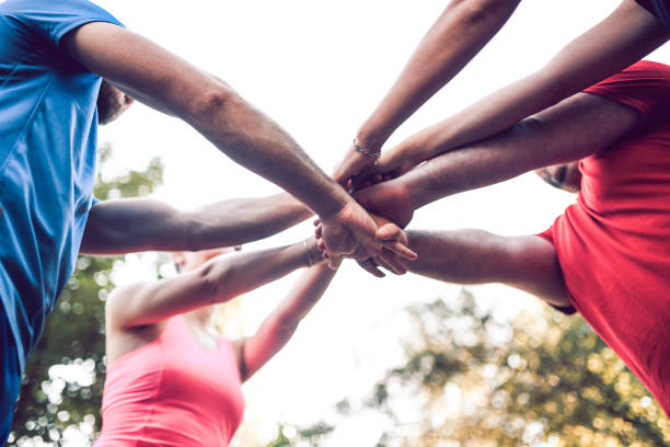 istock Team Of Athletes Preparing To Start Training 1179047177