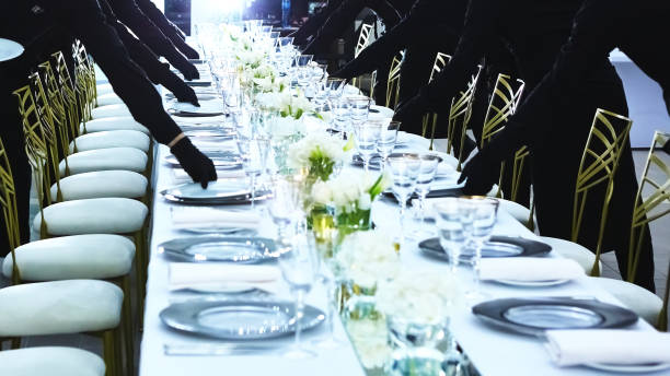 istock Large group of waiters serving a banquet. 1179047760