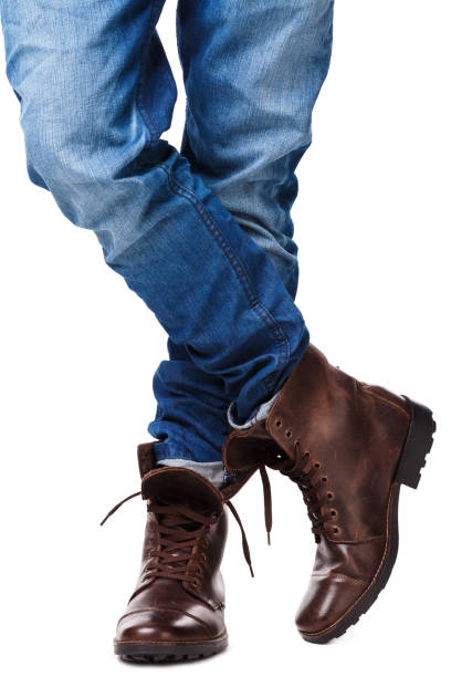 istock Male legs in jeans and leather boots 1179047763