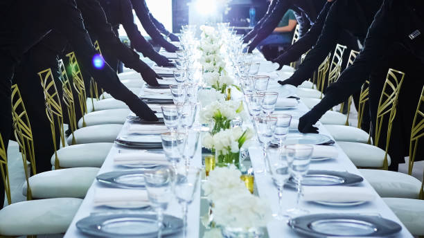 istock Large group of waiters serving a banquet. 1179047782