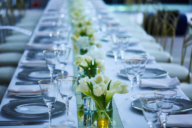 istock Elegance table set up with lotus flowers, selective focus. 1179047804