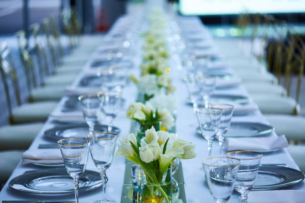 istock Elegance table set up with lotus flowers, selective focus. 1179047966