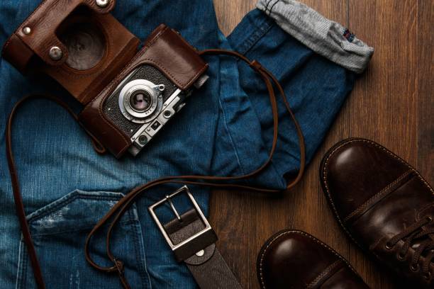 istock Jeans, boots and photo camera 1179048207