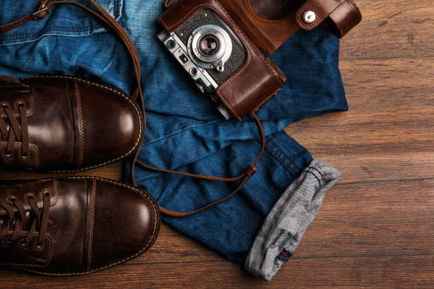 istock Jeans, boots and photo camera 1179048215