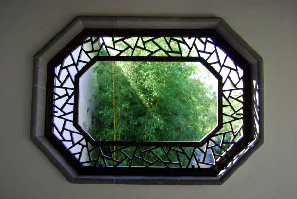 Zen like window to bamboo gardene scene