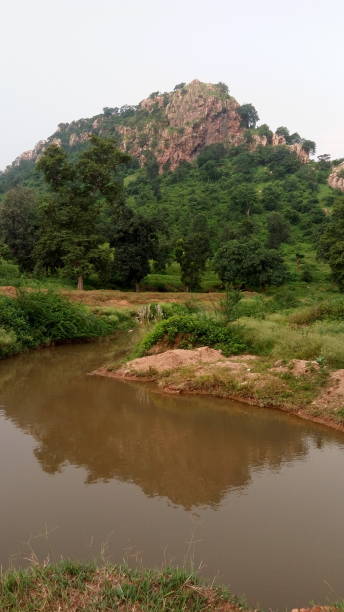 istock Rain water flowing from hills to planes. 1179052232