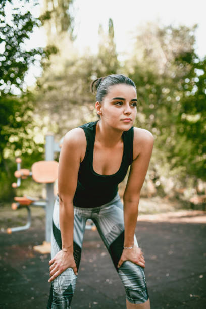 istock Female Athlete In Between Exercises 1179053074