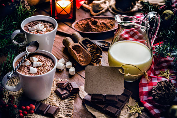 istock Christmas table setup with homemade chocolate mug, marshmallows and empty label 1179053310