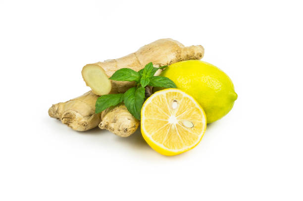 istock Group of ripe fresh lemons with mint leaves and ginger root isolated on white background. Citrus fruit, lime 1179054184