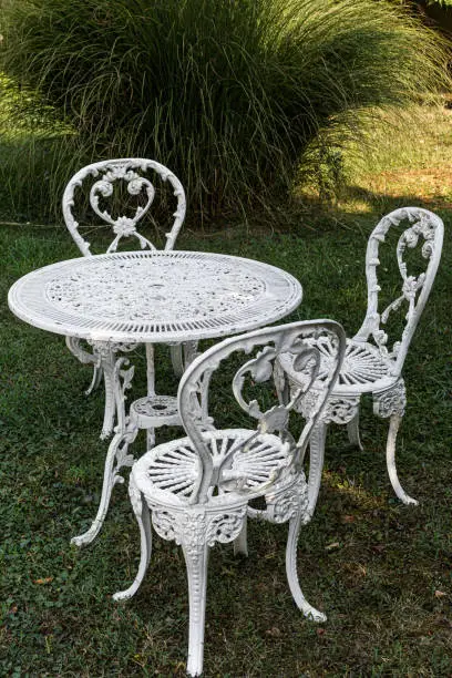 Old metal table and chairs in the garden