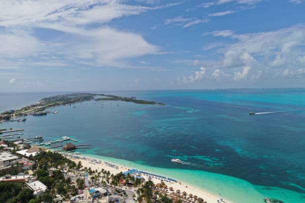istock island women aerial view 1179058432
