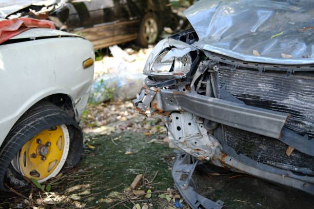 istock crashed damaged broken car. automobile crash accident 1179065853