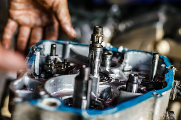 istock Maintenance and fix repair gear engine hand of technician close up 1179067522