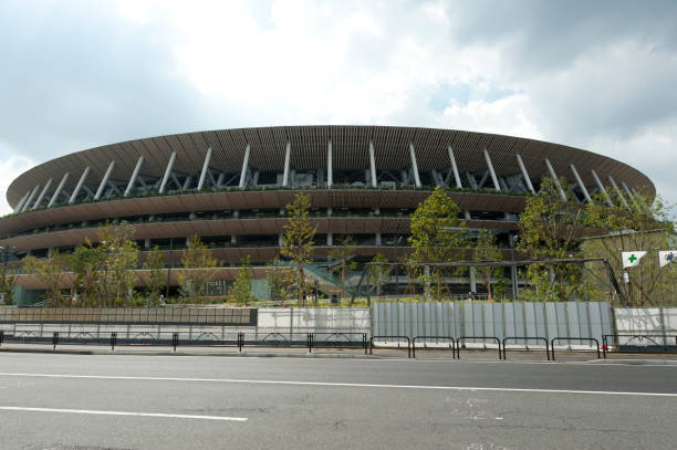 Front view of the Tokyio New National Stadium under construction for the 2020 Olympiad. View of the sales ticket counter. SHINJUKU CITY, TOKYO, JAPAN - SEPTEMBER 30, 2019: Front view of the Tokyio New National Stadium under construction for the 2020 Olympiad. View of the sales ticket counter. paralympic games stock pictures, royalty-free photos & images