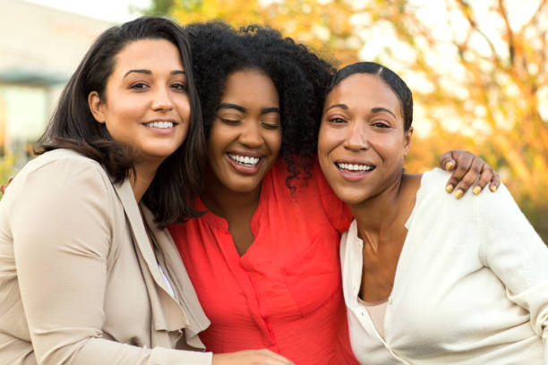 istock Multi-ethnic group of women laughing and talking. 1179090828