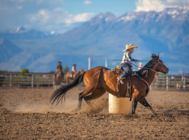 istock Young cowboy barrel racing rodeo 1179100300