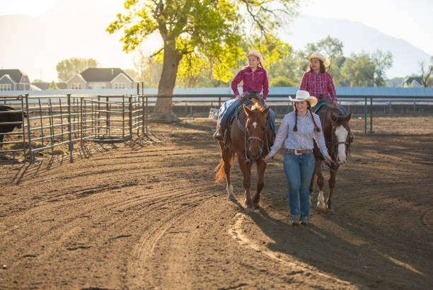 istock Horseback ridding training lessons with friends 1179102048