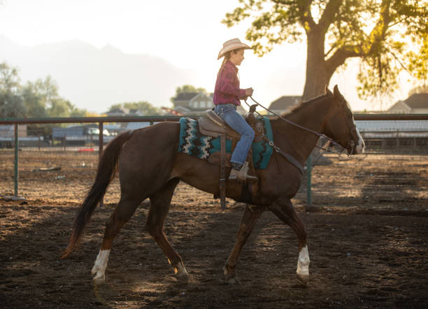 istock Cowgirl Horseback Riding 1179102283