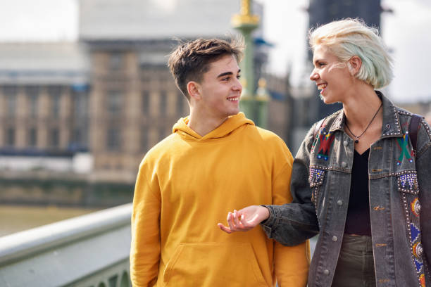 istock Happy couple by westminster bridge, River Thames, London. UK. 1179104004