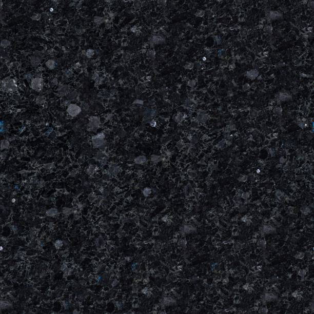 istock Dark relief labradorite texture with glaring stones. Seamless square background, tile ready. 1179104048