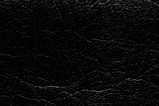 istock Strict black leatherette background. Superlative dark leatherette texture. 1179104087