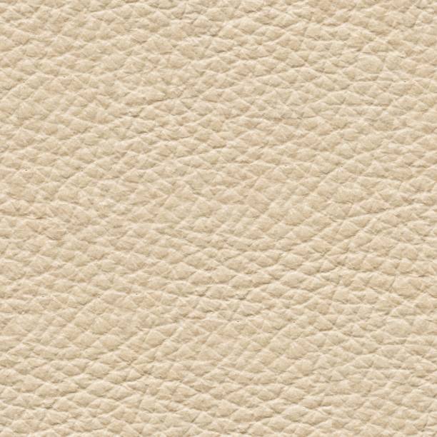 istock Usual beige leather background for your classic style. Seamless square texture. 1179104101