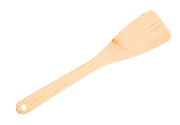 istock Wooden padle close-up isolated on white background. 1179104681