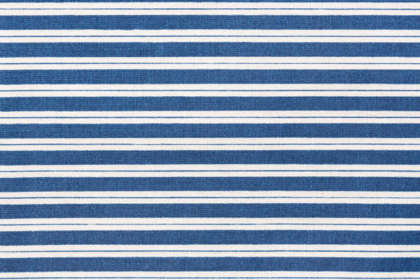 istock Purple and blue striped fabric texture with copy space. 1179104759