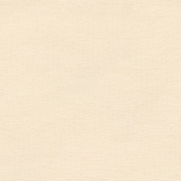 istock Light beige, cream, yellow felt background. Seamless square texture, tile ready. 1179104761