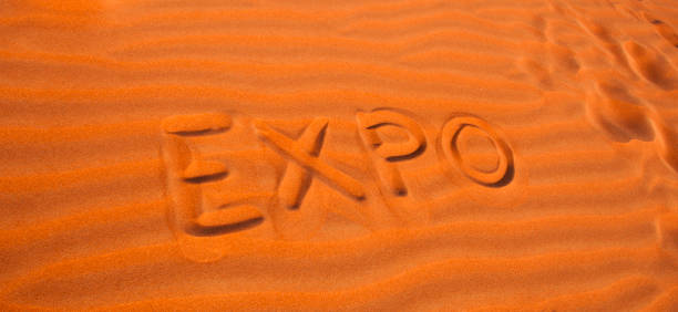 text 2020 expo for Dubai concept written in desert sand