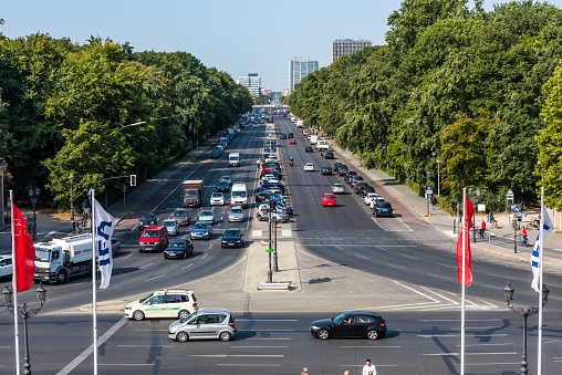 Panoramic city view of Berlin street with lots of cars from the top of the Berlin Victory Column in Tiergarten, Berlin, Germany.