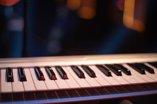 istock the piano on stage in the spotlight. 1179112916